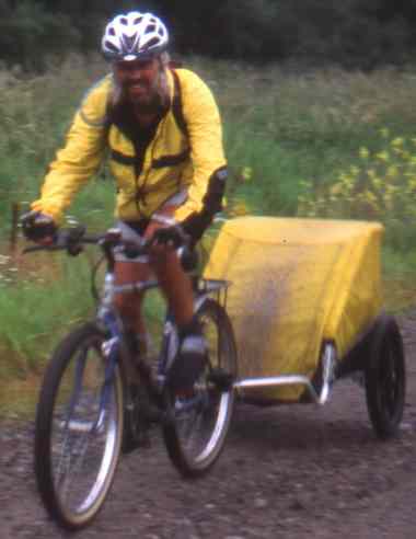 Frith pulling bob on way to breakfast at Three Lakes general store.
