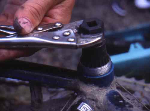 Brady tightening Peter's bottom bracket.