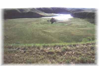 Bird's eye view of camp at Poverty Rock Campsite from canyon rim.